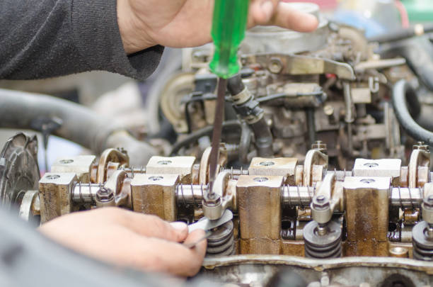 istock Machinists are tuning the valve repair machine. 815748300
