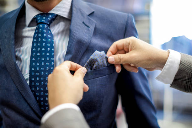 istock A personal stylist helping his customer 815753228