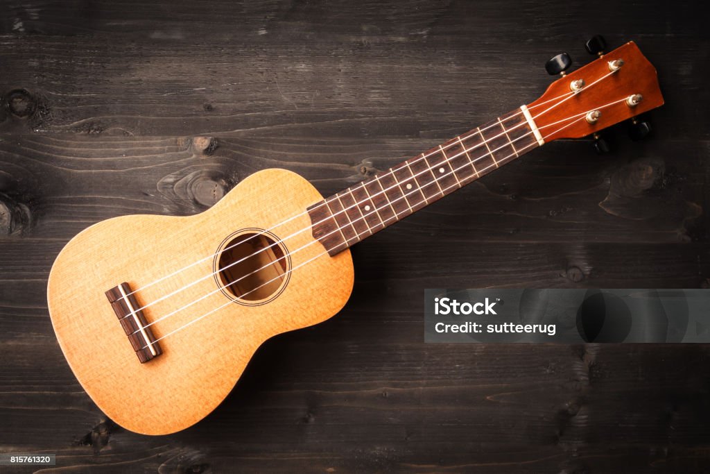 On Black Wooden Background Acoustic Music Instrument Top View Stock Photo - Image - iStock