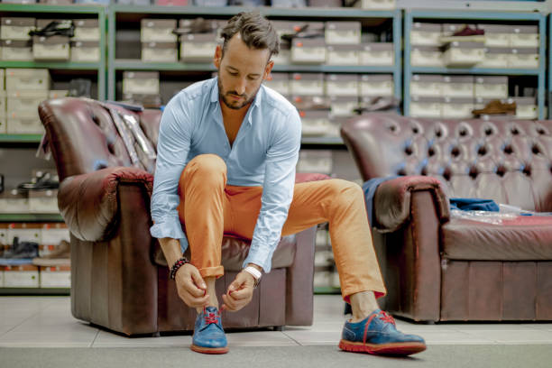 istock Young businessman shopping shoes 815761410