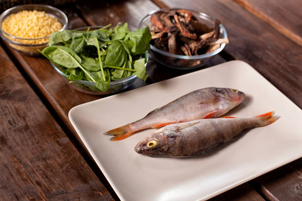 fish on textured wooden background. Culinary healthy cooking.