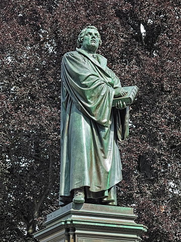 Martin Luther Monument in Worms, Germany. The monument was unveiled in 1868. The design of the monument was by the German sculptor Ernst Rietschel, who made the statue of Luther also.
