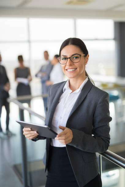 istock Businesswoman with digital tablet at work 815779406