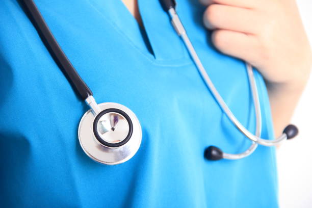 istock Doctor woman with stethoscope on white background 815783306
