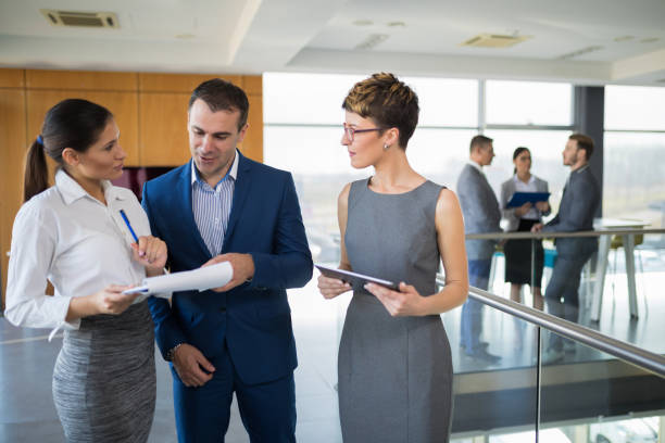 istock Business people having an informal meeting, using digital tablet 815792208