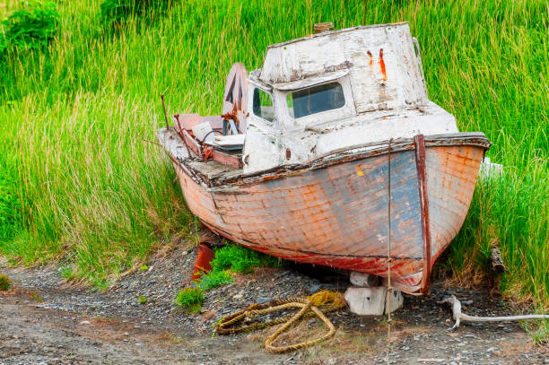 istock Boat left to rot on dry ground 815796716