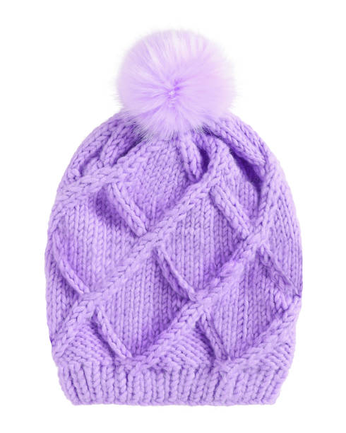 Violet winter knitted cap hat with a pom-pom isolated white