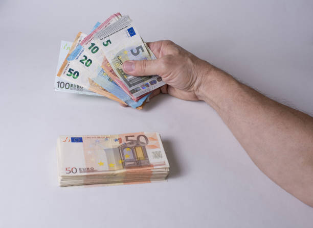 istock Euro money in the hand ready to spend 815853830