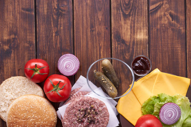 istock Top view of raw cheeseburger ingredients 815867038