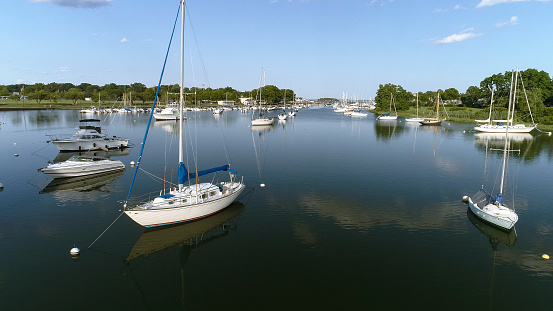 The aerial view to the yachts in the Marina in Mamaroneck, Westchester, New York, USA. The sunny summer day.