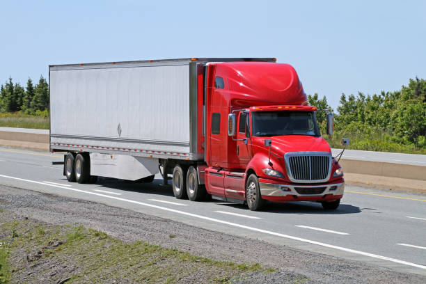 istock Semi Truck Travelling On Highway 815878032