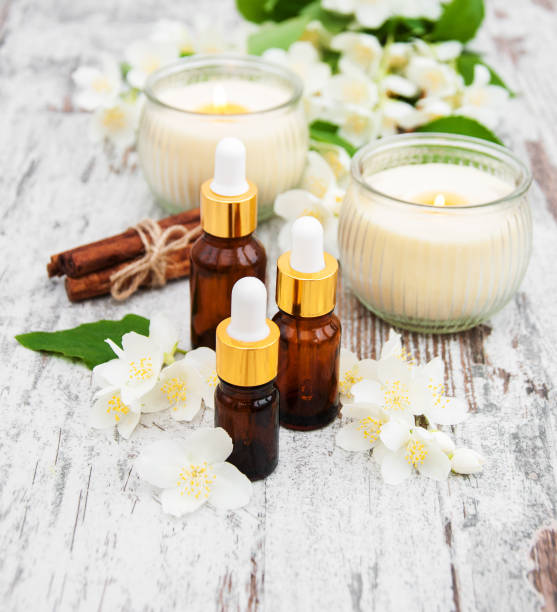 istock Massage oils and jasmine flowers 815882658