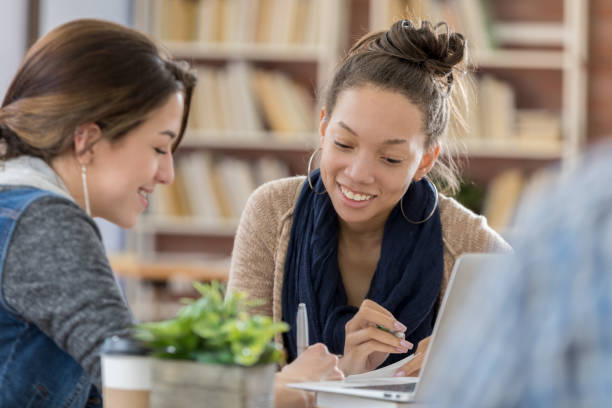 istock College girls participate in study group 815897922