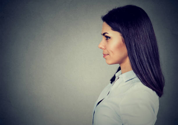istock Side profile of a happy smiling woman 815909918