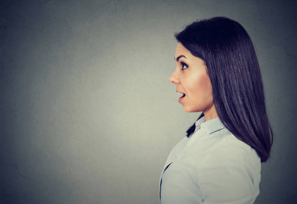 istock Side profile of a shocked woman 815909946