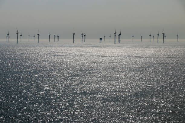 Offshore wind farm in the sea Offshore wind farm in the sea. Wind turbine in the water Europa stock pictures, royalty-free photos & images