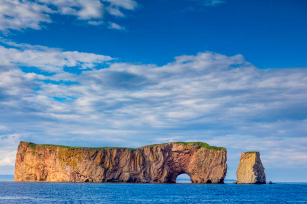 A look at the famous Rocher Percé (Perce Rock), part of the Gaspé peninsula in the Canadian province of Québec. Travel photography. gulf of st lawrence photos stock pictures, royalty-free photos & images