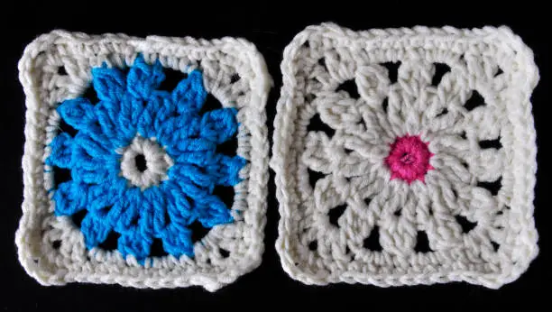 Crochet is a process of creating fabric by interlocking loops of yarn, thread, or strands of other materials using a crochet hook.