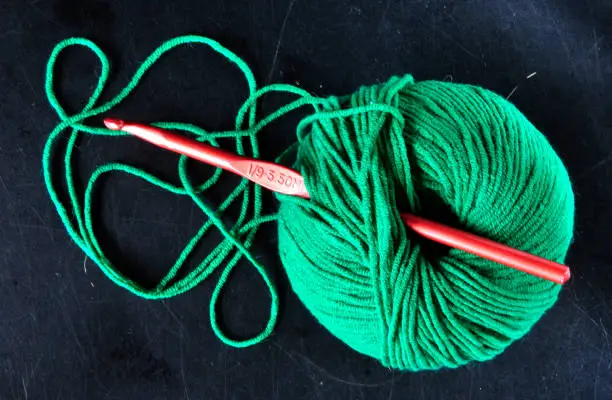 A ball gets its name from the circular ball-like shape of the yarn. Many knitters will roll their yarn from a skein or hank into a ball for ease of use. Rolling skeins that have lost their shape because of how little yarn they have into a ball is an easy way to keep your yarn from tangling as you knit.