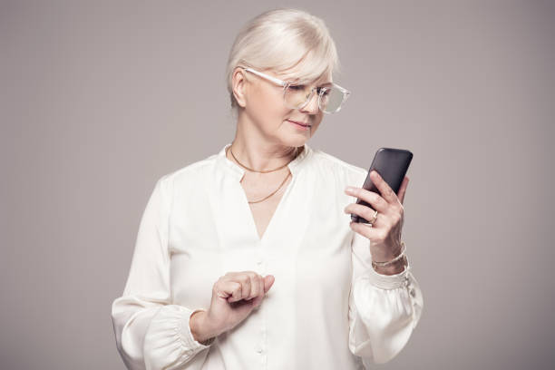 istock Elegant senior woman in studio. 815984744