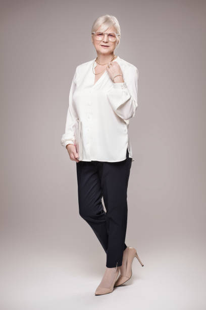 istock Elegant senior woman in studio. 815984760