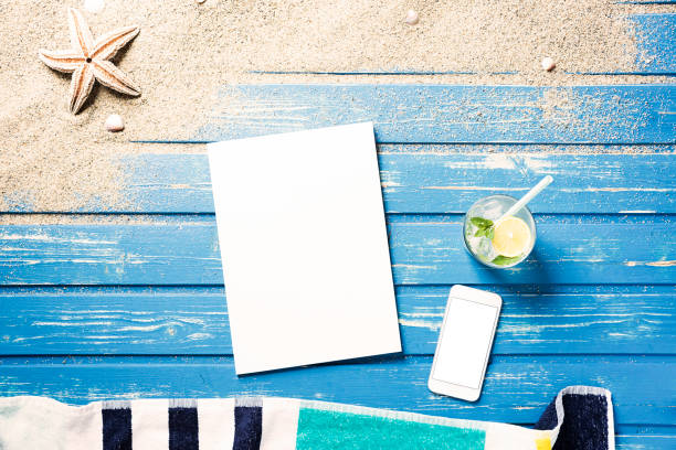 istock White blank magazine on beach towel 815989070