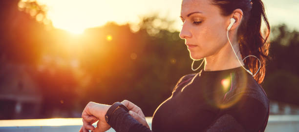 istock Women checking fitness tracker 815989108