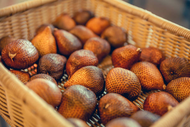 Close up of snake fruit inside rattan basket
