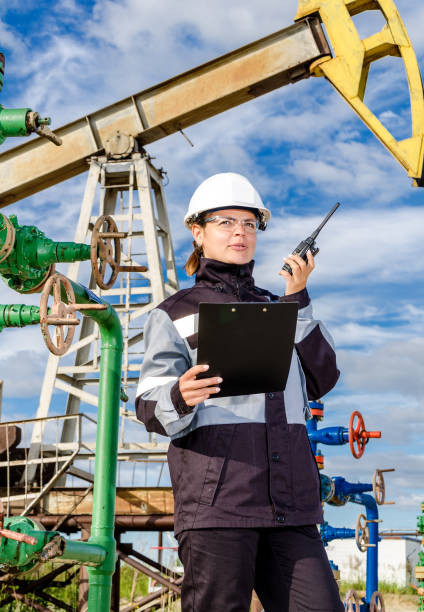 istock Woman engineer in the oilfield 816099164