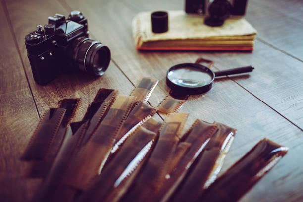 istock Vintage photo camera on a wooden table 816101830