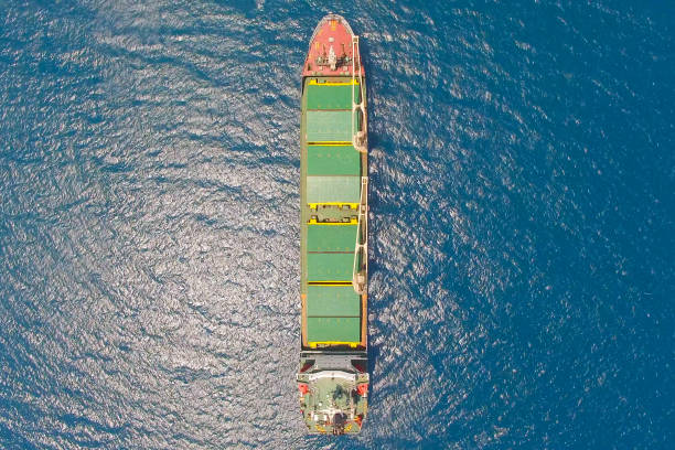 istock General cargo ship at sea - Aerial image 816107162