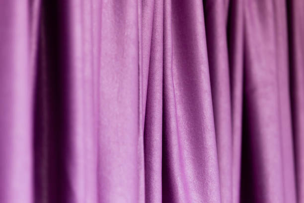 istock Purple cloth on the curtain as a background 816107404