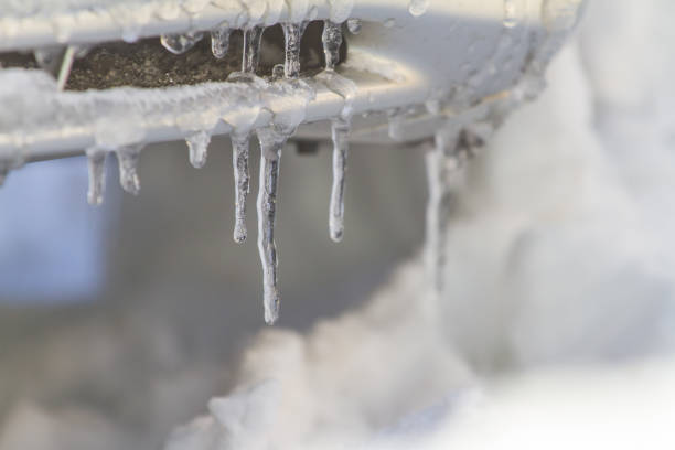 istock Icicle hanging from the side of the roof 816109680
