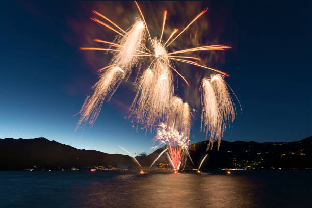istock Fireworks on the lake in summer night 816122678