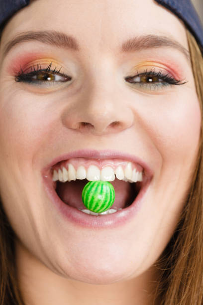 istock Attractive girl chewing gum. 816152266