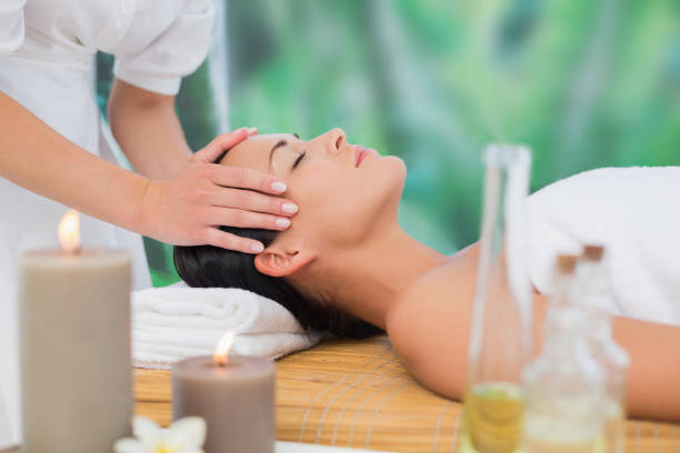 istock Beautiful brunette enjoying a head massage 816159746