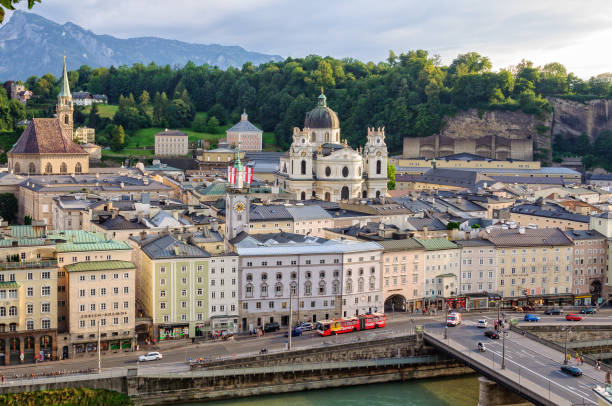 blick vom kapuzinerkloster - salzburg - kollegienkirche stock-fotos und bilder