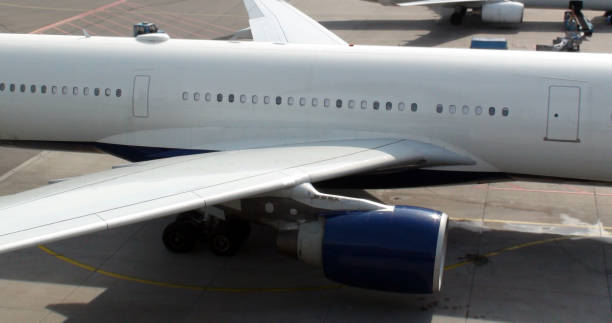 istock Aerial View Of Aircraft Engine And Window At Airport Loading,Unloading Gate 816207586