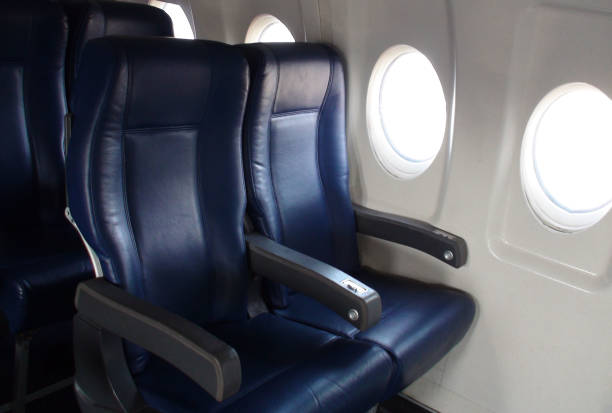 istock Interior Of Passengers Airplane With Empty Seats View At Airport 816207670