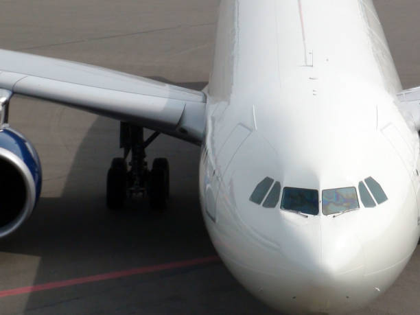 istock Parked Passengers Airplane Engine,Nose Cone And Tire Scene 816207726