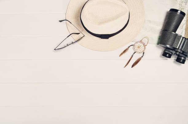 istock Accessories for travel top view on white wooden background frame 816240408