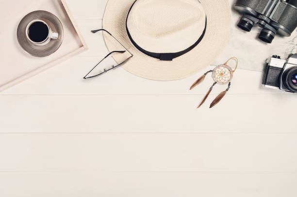 istock Accessories for travel top view on white wooden background frame 816240448