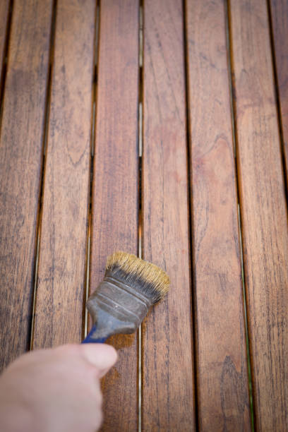 istock Paintbrush in hand and painting 816245552