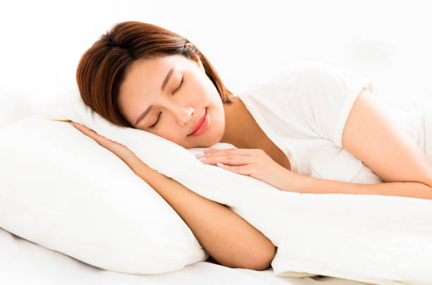 istock young beautiful woman sleeping in the bed 816246152