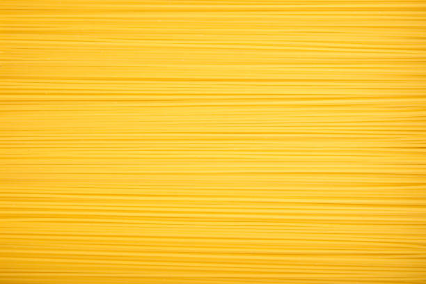 istock Uncooked italian spaghetti. Background of pasta closeup. 816249506