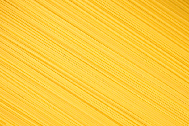 istock Uncooked italian spaghetti. Background of pasta closeup. 816249620