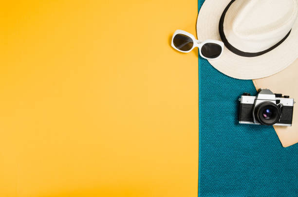 istock Accessories for travel top view yellow background with copy space 816253874