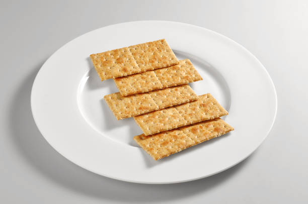 istock Round dish with crackers made with whole wheat 816270672