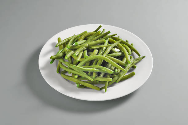 istock Round dish with a portion of boiled green beans 816271068