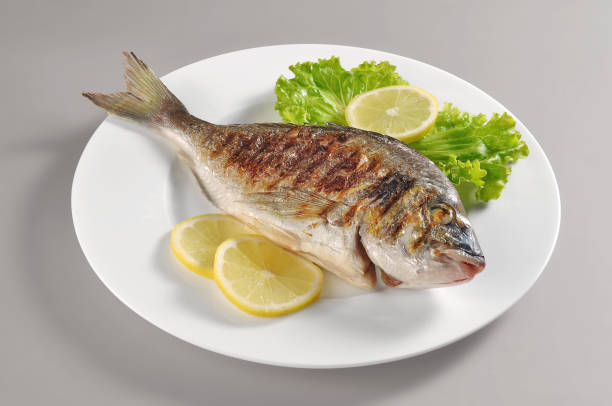 istock Dish with grilled fish gilthead bream 816273958
